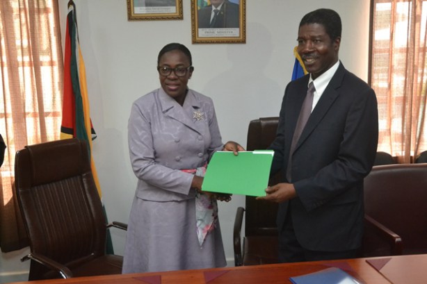 Minister of Education, Nicolette Henry and OAS Country Representative, Jean Ricot Dormeus with the MOU(March 29, 2018)